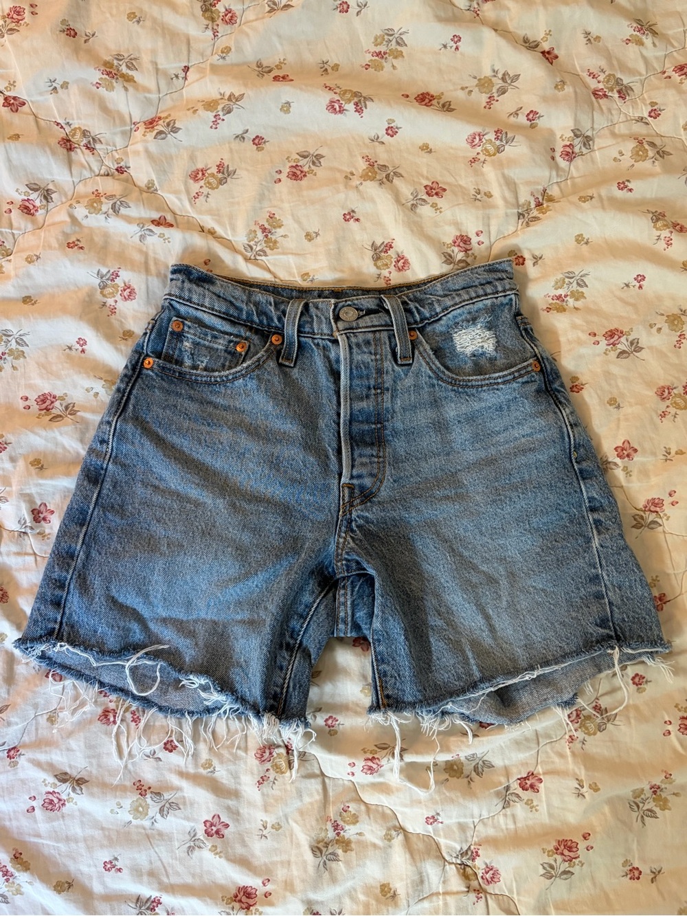 Levi's 501 Light Blue Distressed Denim Shorts